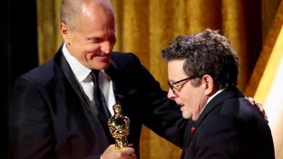 Michael J. Fox receives an honorary Oscar award from Woody Harrelson